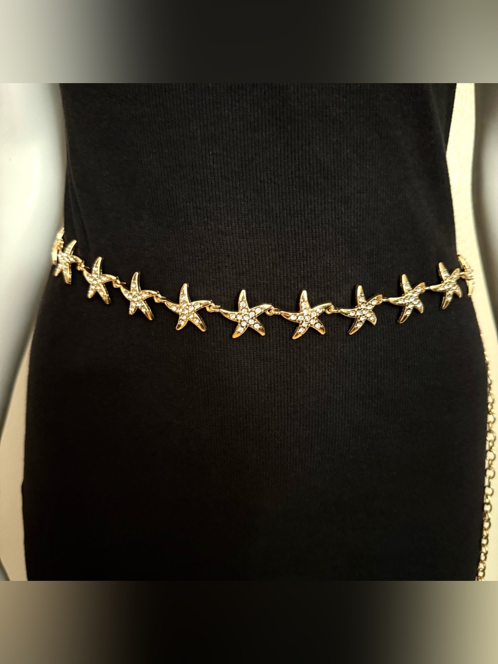 Gold tone starfish with rhinestone details chain belt